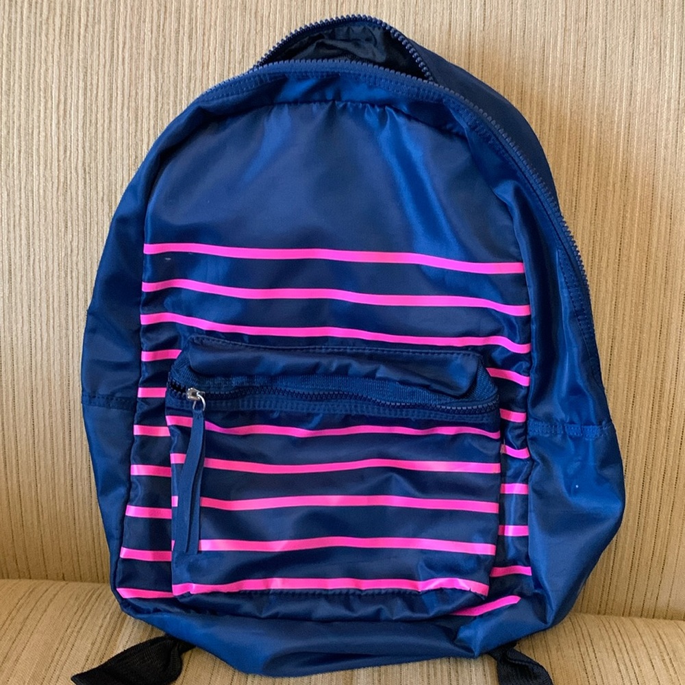 Cynthia Rowley blue pack pack with pink stripes.